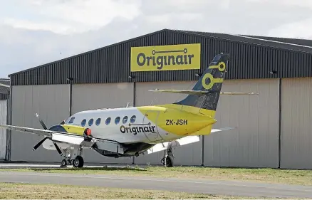  ?? MARTIN DE RUYTER/STUFF ?? An Originair Jetstream aircraft at Nelson Airport during the Covid-19 lockdown. The Nelson-based airline has announced the resumption of its flight schedule from May 29.