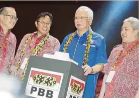  ??  ?? Prime Minister Datuk Seri Najib Razak launching Parti Pesaka Bumiputera Bersatu’s (PBB) 14th general assembly in Kuching yesterday. With him is Sarawak Chief Minister and PBB president Datuk Patinggi Abang Johari Abang Openg (second from left).