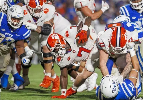  ?? Ben McKeon/Associated Press ?? Duke’s defense stops Clemson’s Phil Mafah just short of the goal line in the second half Monday night. Clemson had three possession­s stymied inside the Duke 10-yard line in what became a 28-7 loss to the Blue Devils.