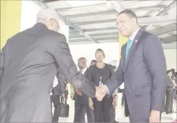  ??  ?? President David Granger (left) greeting Jamaican Prime Minister Andrew Holness (DPI photo)