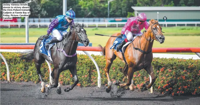  ?? ?? Jockey Vanessa Arnott storms to victory aboard the Chris Pollard-trained Cudjerie at Fannie Bay on Friday. Picture: Caroline Camilleri