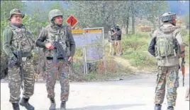  ?? ANI ?? Army jawans stand guard near the encounter site in Pulwama district on Tuesday.