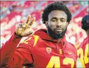  ??  ?? ABDUL- MALIK McCLAIN, Munir’s older brother, is a redshirt sophomore linebacker for the Trojans.