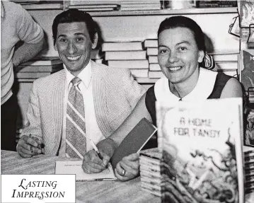 ??  ?? HARVEY AND
Audrey at a signing for their book about Tandy the elf.