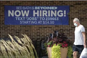  ?? (AP) ?? A jobs posting sign is displayed in Deerfield, Ill., in this September file photo. Initial unemployme­nt claims rose by 9,000 to 228,000 in the week that ended Saturday Oct. 8, Labor Department data showed Thursday.