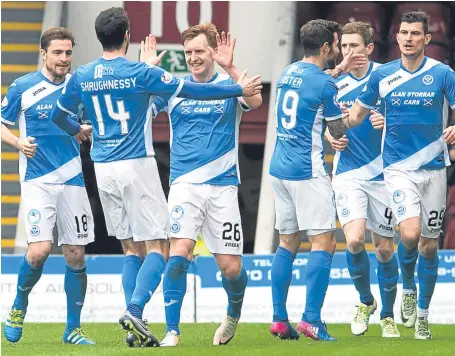  ?? SNS. ?? Liam Craig, centre, celebrates scoring against Motherwell to leave Saints on the brink of a top-six finish.