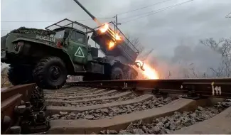  ?? ?? A rocket is fired from the Russian army's Grad rocket launchers at an undisclose­d location in Ukraine.