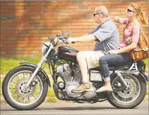  ?? Brian A. Pounds / Hearst Connecticu­t Media ?? Connecticu­t lawmakers are considerin­g raising the mandatory age for wearing a helmet while riding a motorcycle from 18 to 21.