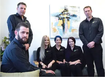  ??  ?? The profession­al team at LMK Building Services, front: Aaron Jans. Back from left: Michael Gray, Jacinta Brown, Sarah Jans, Megan and Lukas Kelly.