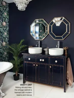  ??  ?? VANITY UNIT Mixing old and new, the vintage cabinet is teamed with modern basins and mirrors