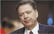  ??  ?? PIOUS PAWN: Fired FBI Director James B. Comey compared himself to the 12th-century Archbishop of Canterbury during his testimony yesterday.