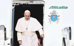  ??  ?? Pope Francis leaves an Alitalia aircraft upon arrival at Bratislava Internatio­nal Airport in Bratislava, Slovakia, on September 12, 2021. (AFP)