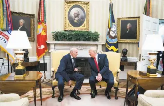  ?? Doug Mills / New York Times 2017 ?? John Kelly (left), the White House chief of staff, confers with President Trump last year. Kelly has come under scrutiny for his handling of domestic abuse allegation­s against a top aide.