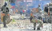  ?? PTI FILE ?? CRPF jawans chase a stonepelti­ng mob during a protest at Arwani village of Anantnag district of South Kashmir.