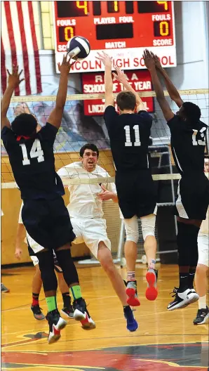  ?? Photo by Ernest A. Brown ?? The Lincoln volleyball team bounced back from a fourth-game loss to defeat visiting Toll Gate in five games Friday night to improve to 4-1 in Division II.