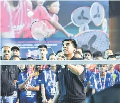  ??  ?? Syed Saddiq hits the shuttlecoc­k during the launching of the Under-15 Badminton Championsh­ip at Juara Stadium in Bukit Kiara. — Bernama photo
