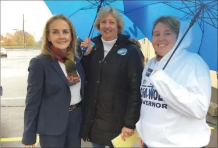  ?? EVAN BRANDT — DIGITAL FIRST MEDIA ?? Madeleine Dean, left, shown here with Boyertown School Board member Jill Denninm center, and former candidate Rachel Hendricks outside the polling place at the Gilbertsvi­lle firehouse Tuesday.