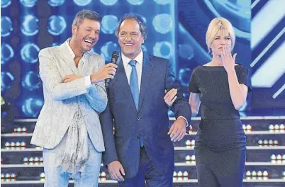  ?? Ideas del sur ?? scioli, primero en salir al aire, junto a Tinelli y Karina Rabolini