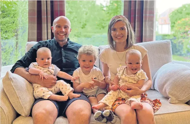  ?? ?? JOURNEY: Jamie and Emma Coffey with twins Campbell and Hamish, who have just celebrated their first birthday, and oldest son Ruaridh, three.