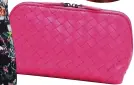  ??  ?? ICONIC GLAMOUR Bottega Veneta pink pouch, £340, mytheresa.com