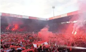  ?? City-Press/Getty Images ?? Union Berlin fans celebrate the club’s promotion to the Bundesliga in 2019. Photograph: