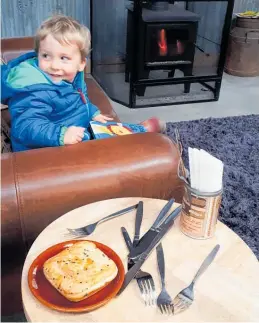  ?? Photo / supplied ?? Above: Graeme Kettle’s son Theo, 3, enjoys lunch at the Packhouse Market as an occasional treat.