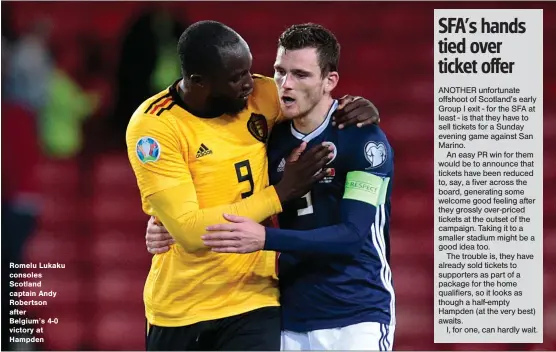  ??  ?? Romelu Lukaku consoles Scotland captain Andy Robertson after
Belgium’s 4-0 victory at Hampden