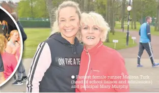  ??  ?? Fastest female runner Melissa Turk (head of school liaison and admissions) and principal Mary Murphy