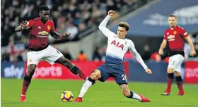  ??  ?? X-rated: Paul Pogba launches his tackle on Dele Alli