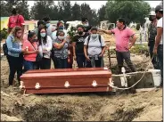  ?? 37, who died in this ?? Relatives Wednesday bury Liliana Lopez, week’s Mexico City Metro collapse. (AP/Marco Ugarte)