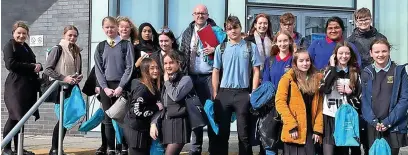  ?? ?? Pupils from The Hollins and Rhyddings Business and Enterprise School attended the Insight into Law event, held at Blackburn University Centre