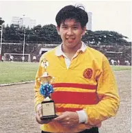  ??  ?? Mr Ekniti as a young man after his rugby team won a match.