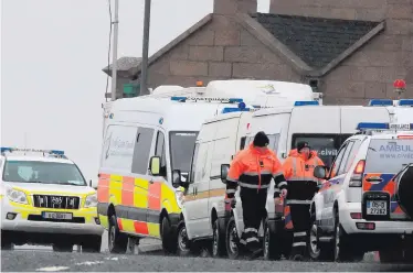  ??  ?? The scene at Blacksod yesterday as the search for the downed helicopter continues