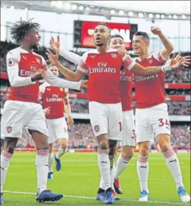  ?? AFP ?? Arsenal's Pierre-Emerick Aubameyang (centre) became the top-scorer in the league with 10 goals.