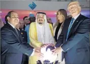  ?? Saudi Press Agency ?? THE TRUMPS join King Salman at the opening of the World Center for Countering Extremist Thought.