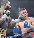  ?? AFP ?? Adrien Broner hits Adrian Granados.