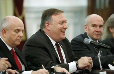  ?? BEAWIHARTA — POOL PHOTO VIA AP ?? U.S. Secretary of State Mike Pompeo, center, talks with Indonesian President Joko Widodo, unseen, during their meeting at Merdeka palace in Jakarta, Indonesia, Sunday.