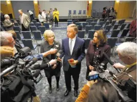  ??  ?? Gov. Bill Haslam, center, answers questions with state Commission­er of Human Services Danielle Barnes, right, and Debra Payne, commission­er of the Department of Intellectu­al and Developmen­tal Disabiliti­es.