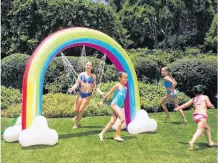  ??  ?? Inflatable sprinklers hook up to the lawn hose and keep kids of all ages cool through the hot summer days. Play Day Rainbow Arch Sprinkler, $40, walmart.ca.