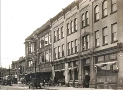  ?? PHOTO COURTESY RYCH MILLS, ?? The Hotel Brunswick was built in the mid-1890s by Samuel Dopp. Edward Lippert purchased it in 1920 and changed the name to Windsor Hotel, selling to band leader Charlie Bruder in 1925. It was destroyed by fire in 1956. This entire strip was removed in...