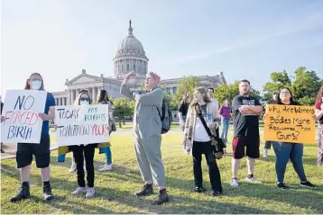  ?? SUE OGROCKI/AP ?? Abortion-rights supporters rally last week at the Oklahoma State Capitol in Oklahoma City.