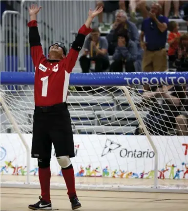  ?? MARTA IWANEK/TORONTO STAR ?? Canada’s Ahmad Zeividavi celebrates his team’s 5-4 victory over the U.S. in goalball at the Parapan Am Games on Saturday.