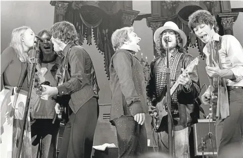  ?? COURTESY OF STEVE GLADSTONE- AND BRIAN D. HARDIN ?? From left, Joni Mitchell, Neil Young, Rick Danko, Van Morrison, Bob Dylan and Robbie Robertson perform during “The Last Waltz” on Nov. 25, 1976, at the Winterland Ballroom in San Francisco.