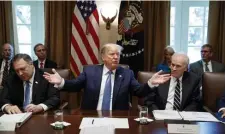  ?? AP ?? RULE CHANGE-UP: President Trump speaks Tuesday during a Cabinet meeting in the Cabinet Room of the White House.