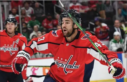  ?? Washington Post file photo ?? Washington Capitals forward Tom Wilson said one of the biggest things he misses during the pandemic teammates on the ice and in the locker room. Wilson said “There’s really nothing like the locker room.”
is spending time with his