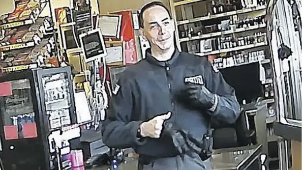  ??  ?? Liquor store surveillan­ce footage from July 31, 2016 entered as a court exhibit shows security guard Sheldon Russell Bentley after he robbed and kicked Donald Doucette. Doucette later died, and Bentley was given a four-year sentence after being convicted of manslaught­er in the case.