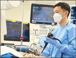  ?? ?? Photo shows TYKFI-ABI scholar Bryan Lao undergoing training in advanced therapeuti­c endoscopy at a hospital in Hong Kong.