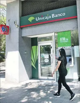  ?? ?? Una sucursal de Unicaja.