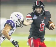  ?? JAKE CRANDALL - THE ASSOCIATED PRESS ?? Austin Peay quarterbac­k Jeremiah Oatsvall (6) runs the ball against Central Arkansas during an NCAA college football game Saturday, Aug. 29, 2020, in Montgomery, Ala.