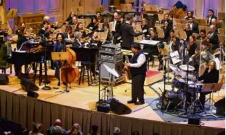  ?? HILARY SCOTT ?? Leo Genovese, esperanza spalding, Dayna Stephens, and Terri Lyne Carrington perform with the Boston Symphony Orchestra and conductor Clark Rundell in “Celebratin­g the Symphonic Legacy of Wayne Shorter.”